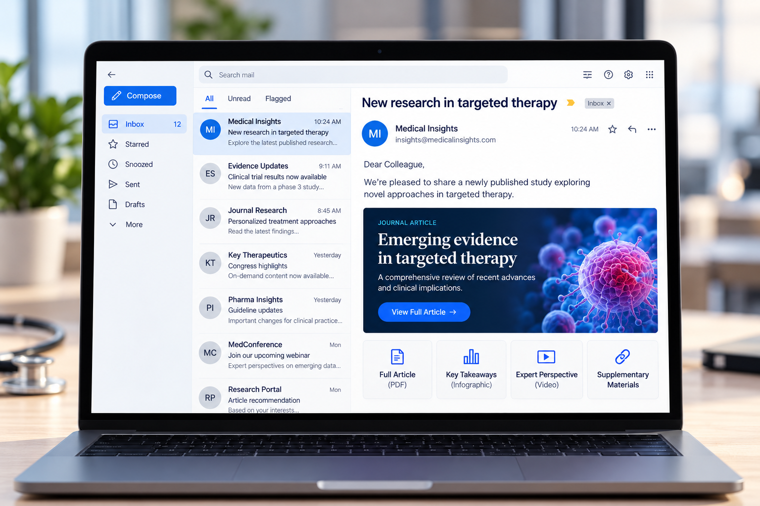 Laptop displaying an email about research in targeted therapy.